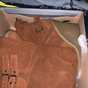 Chestnut colored, wedged boots